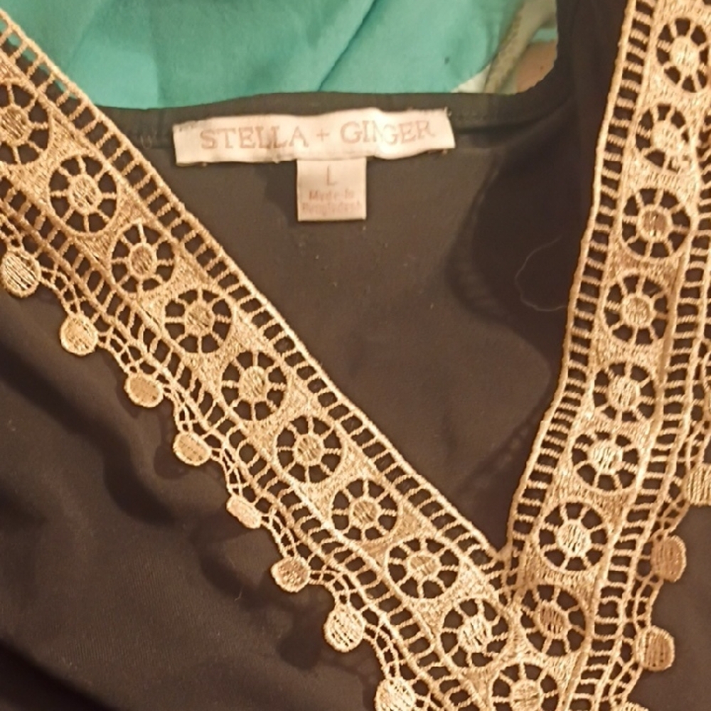 Stellah Black Top with Gold Crochet V-Neck